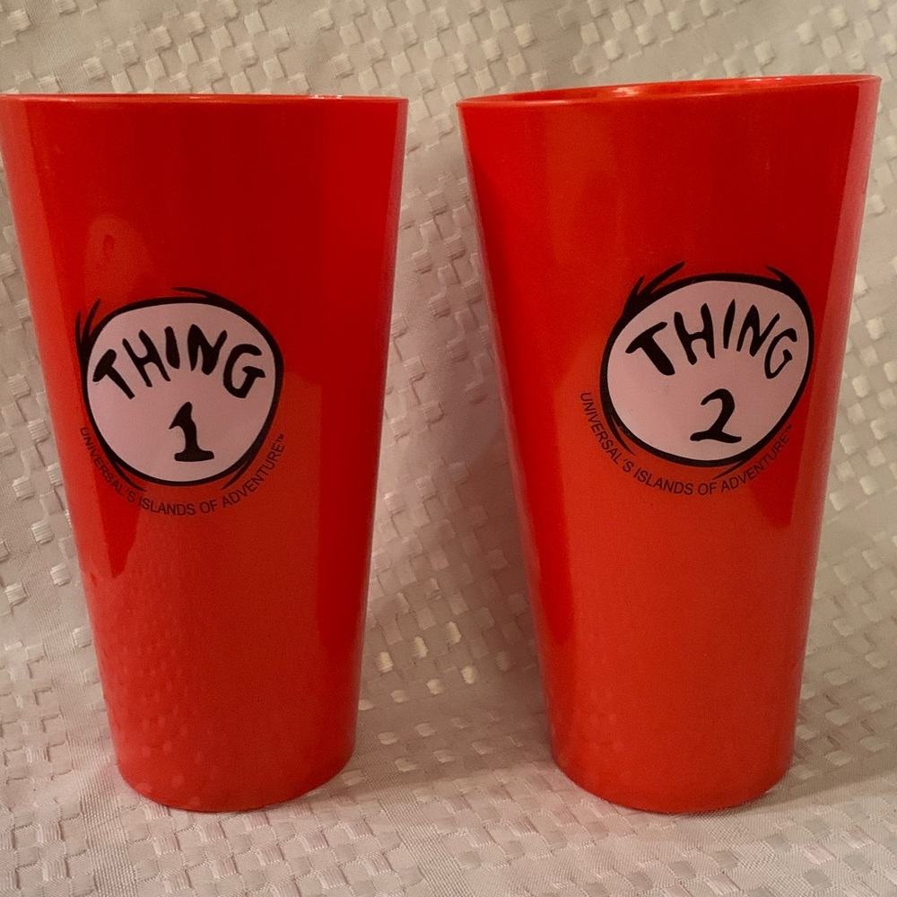 Thing 1 and Thing 2 orange hard plastic tumblers, 6.5 inches tall.